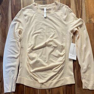 Elegant long-sleeved Athleta jersey cream/ivory size medium athleisure office